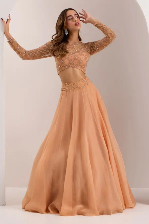Rose gold crystal lehenga for reception with cut dana embroidery by Khaish