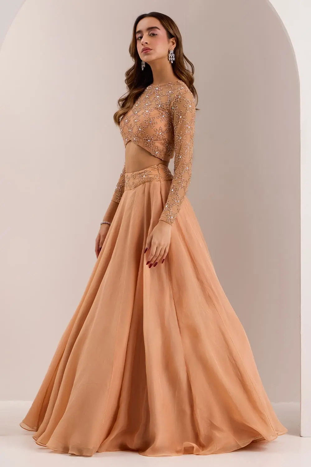 Rose gold organza lehenga with frosted cut dana and crystal sparkle