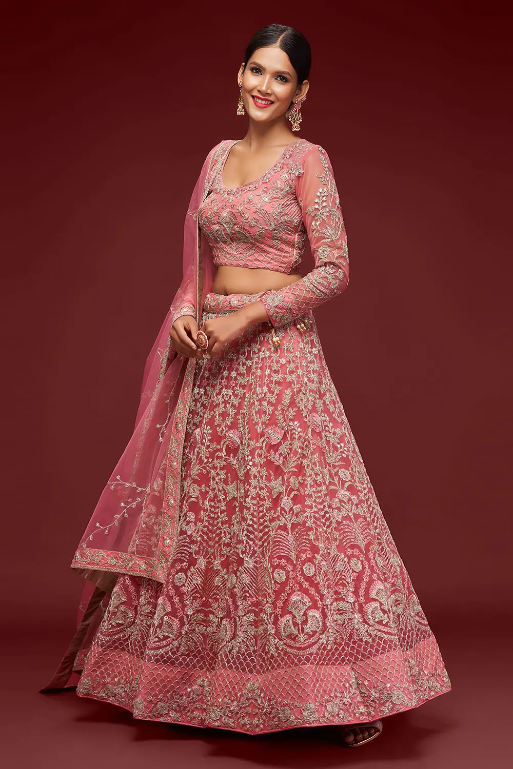 Badla and glitter dori embroidery on fantasy rose net lehenga skirt