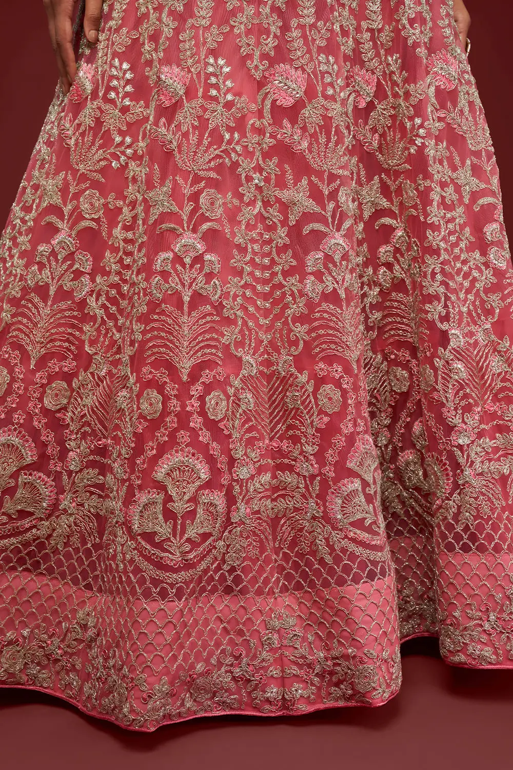 Close up of thread, zari and badla embroidery on fantasy rose lehenga