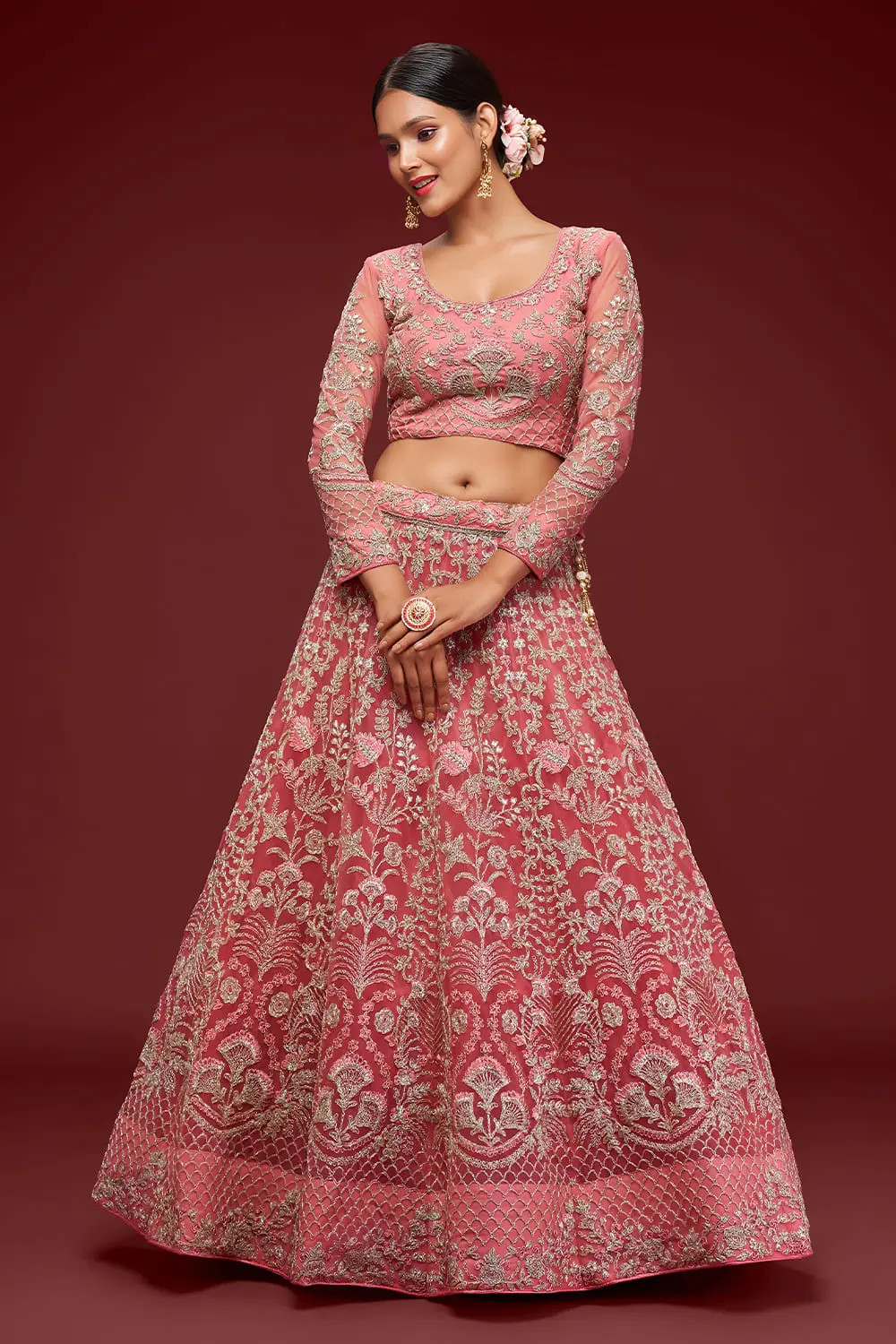Fantasy rose soft net lehenga styled with embroidered blouse and dupatta