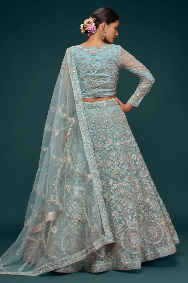 Close up of thread, zari and badla embroidery on aqua blue lehenga