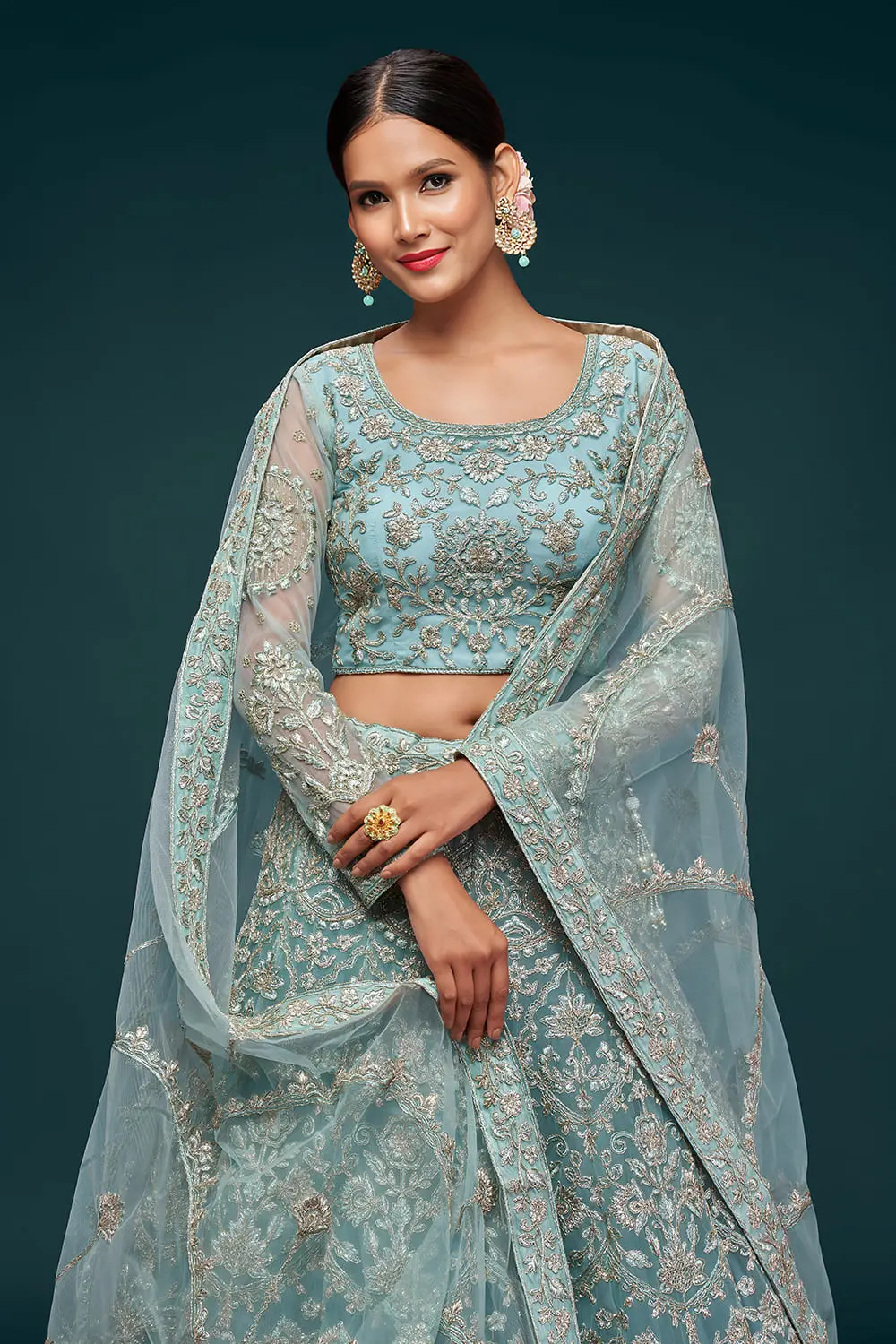 Soft net blouse with thread, zari and badla embroidery in aqua blue