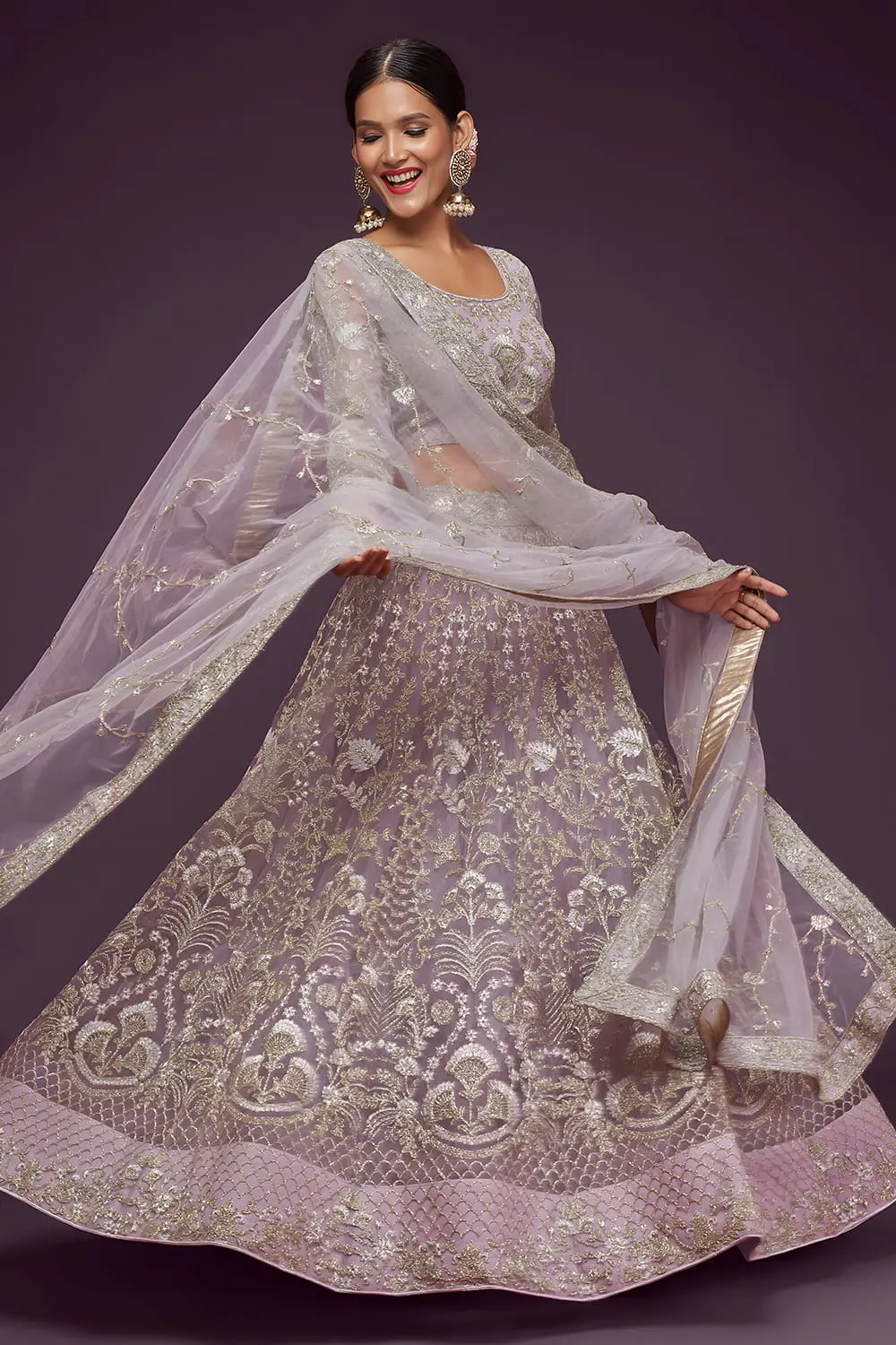 Badla and glitter dori embroidery on dusty purple net lehenga skirt