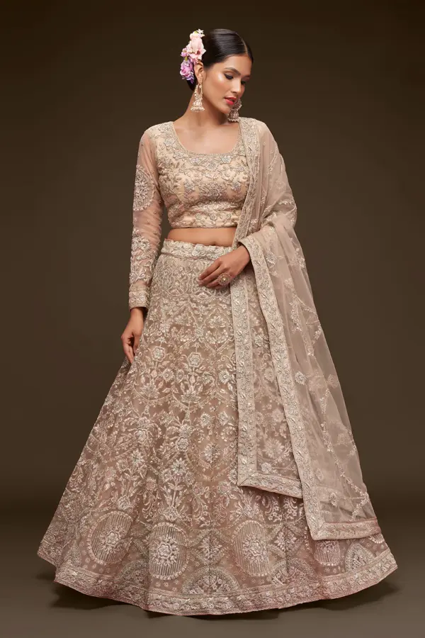 Beige net lehenga choli for wedding with badla and zari embroidery by Khaish