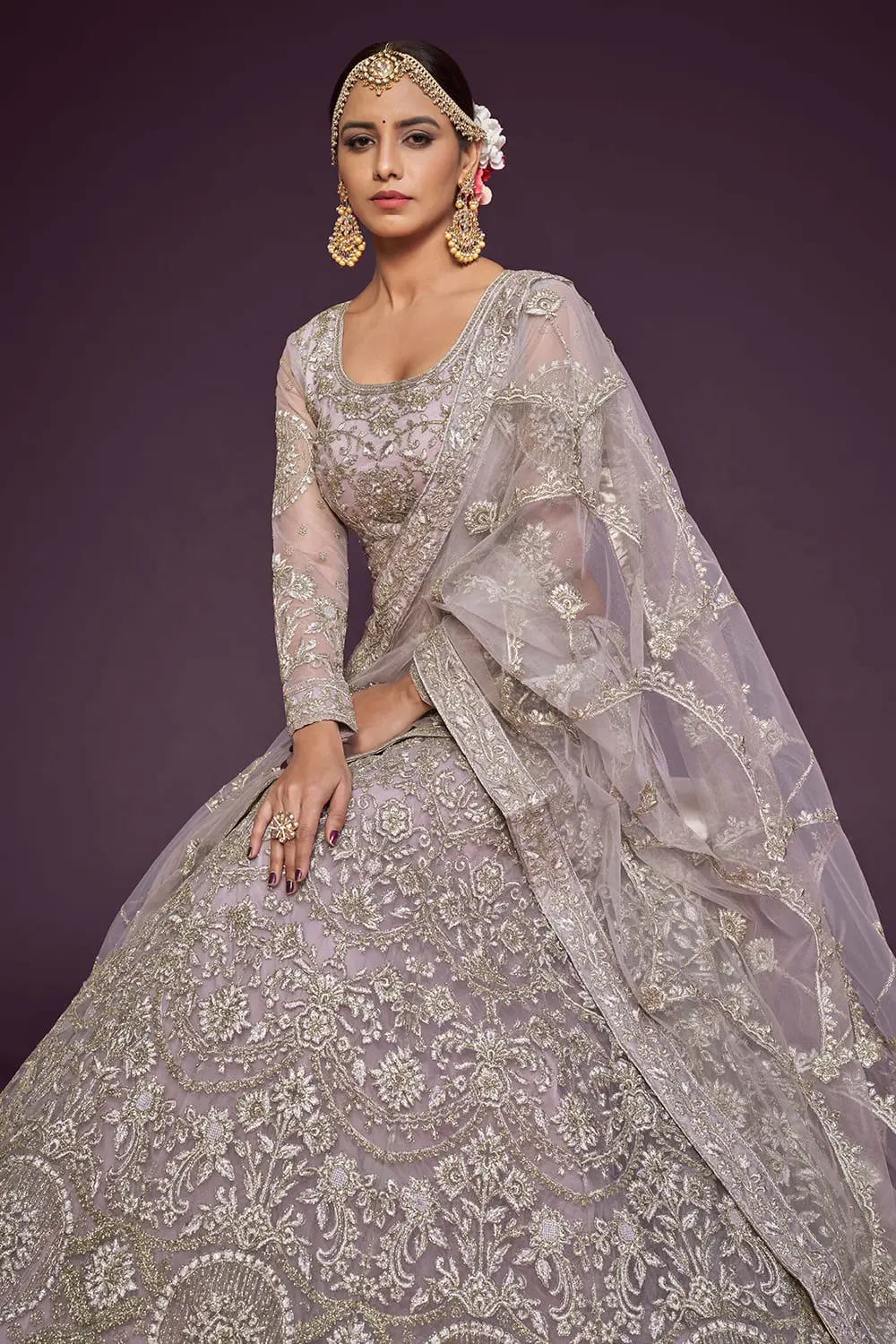 Badla and glitter dori embroidery on lavender net lehenga skirt
