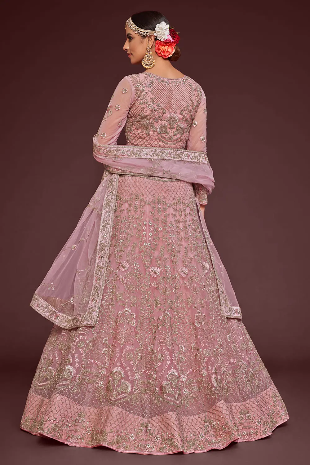 Badla and glitter dori embroidery on rose gold net lehenga skirt