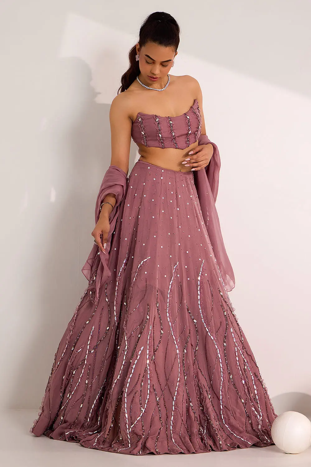Soft mauve organza lehenga choli with dupatta draped view