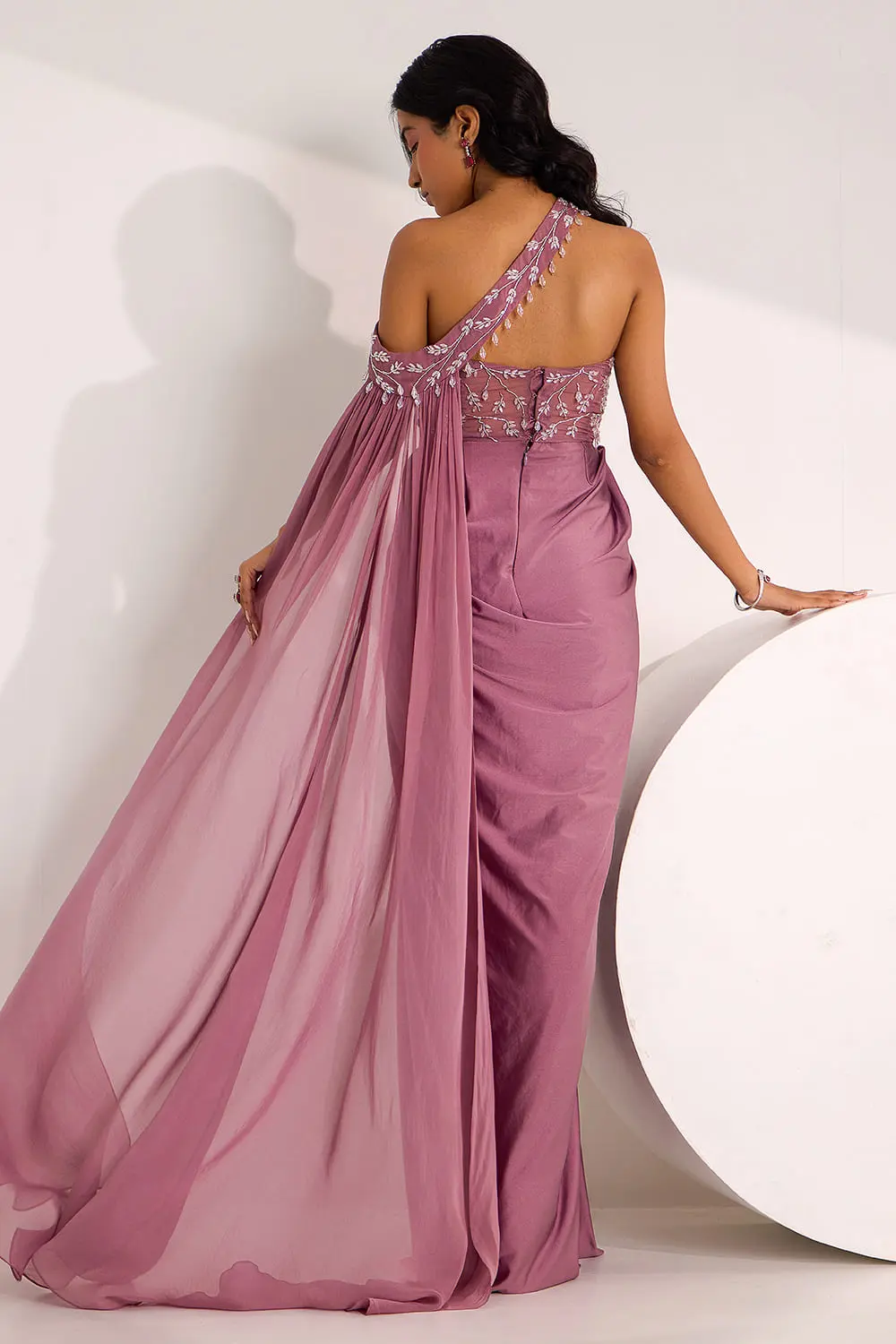Back view of mauve corset saree gown with shoulder drape