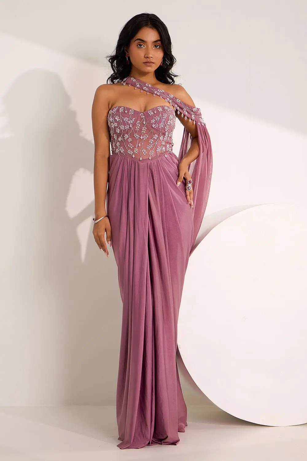 Crystal embroidered mauve pre draped saree gown with corset bodice