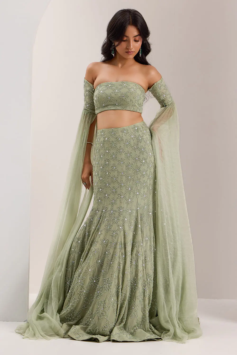 Mint green mermaid lehenga with off shoulder floor length sleeve blouse full view