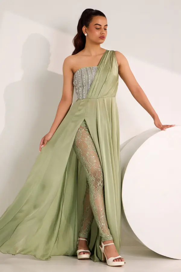 Mint green one shoulder gown for party with high slit and lace legging by Khaish