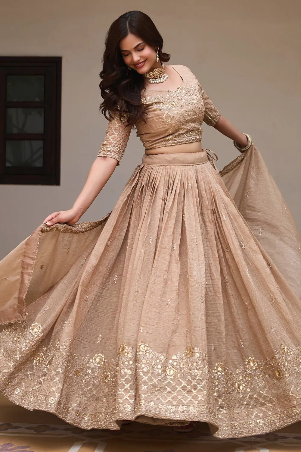 Crunchy silk blouse with embroidery and sequins work in golden beige