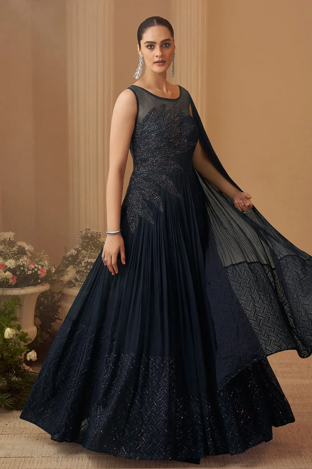 Side view of purple chinon silk cape style wedding gown with can-can flare