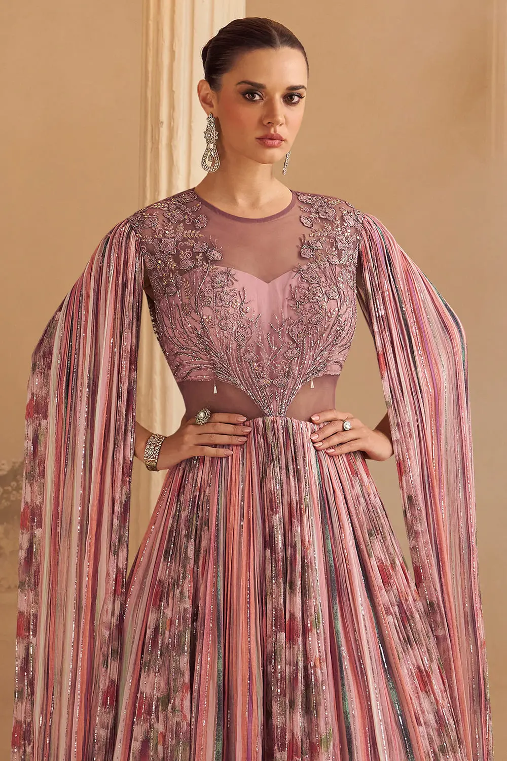 Close up of hand embroidery on rose pink chinon silk cape style gown