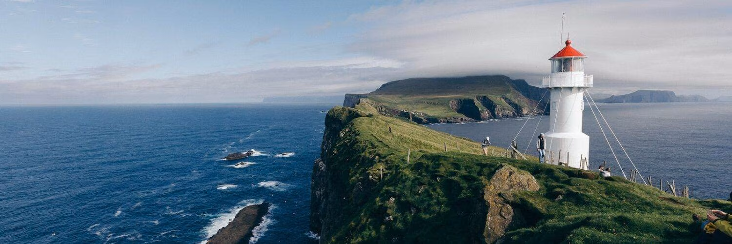 lighthouse near body of water