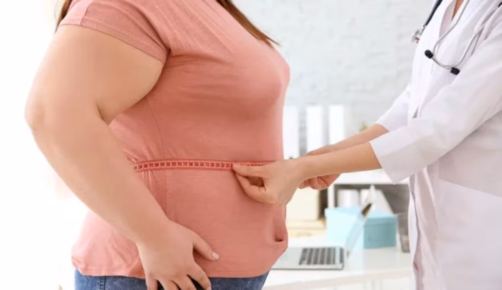 Una dottoressa e una donna obesa (Depositphotos)