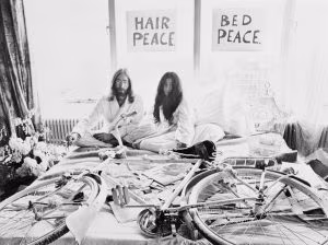 Closeup J.Lennon W/Bride Y. Ono In Bed