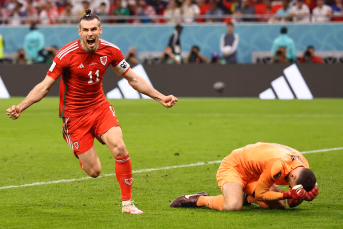 Al Rayyan, Qatar, 21st November 2022. Gareth Bale of Wales celebrates scoring the equalising goal during the FIFA World