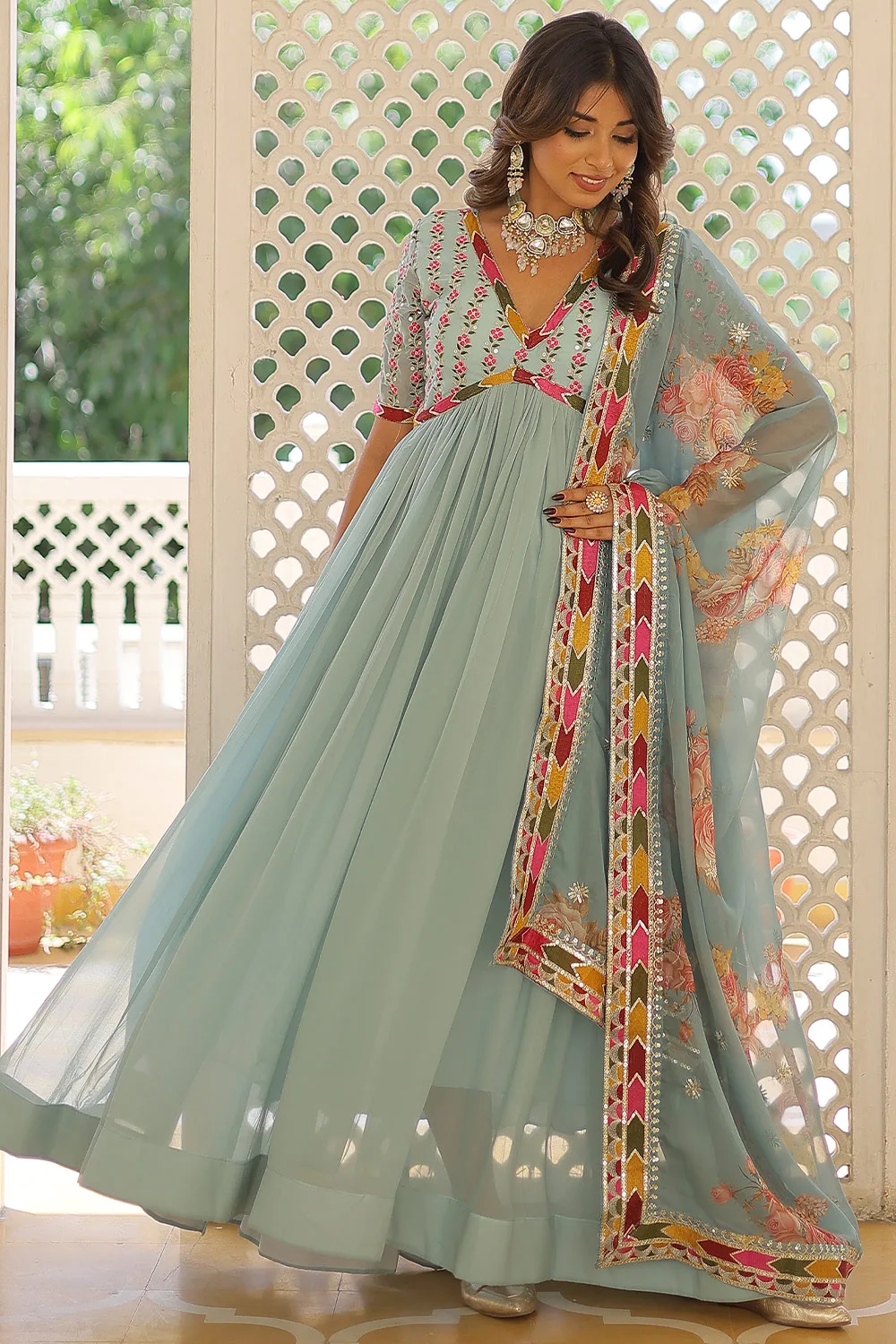 Sky Blue Faux Georgette Alia Cut Gown with Embroidery and Zari Sequins Work - Khaish Sky Blue Faux Georgette Alia Cut Gown with Embroidery and Zari Sequins Work - Khaish