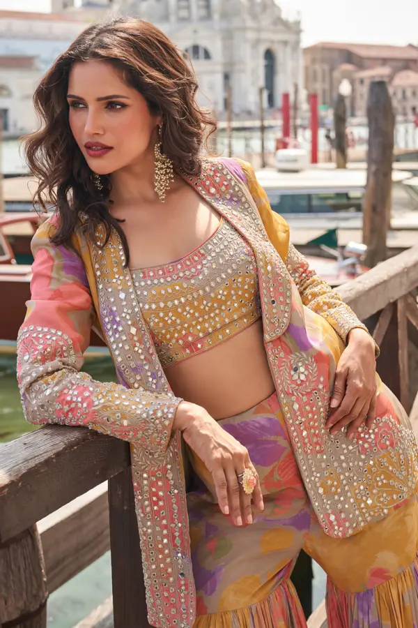 Close-up of abstract print on Orange Sharara Suit top