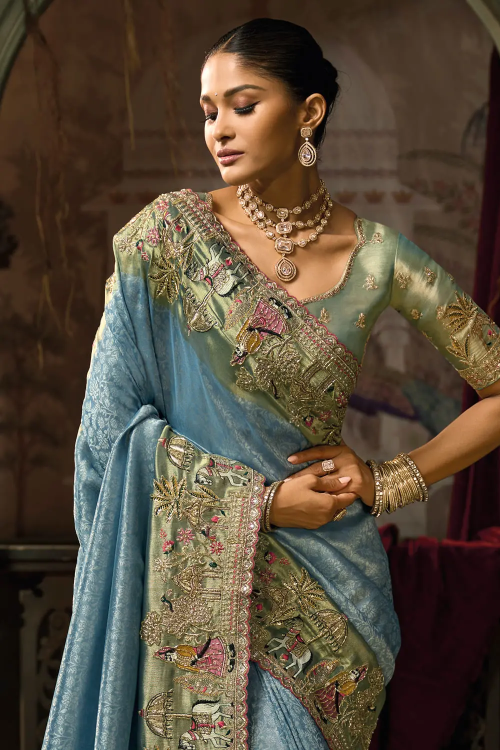 Close-up of cut-dana and thread embroidery on Sea Green banarasi saree body