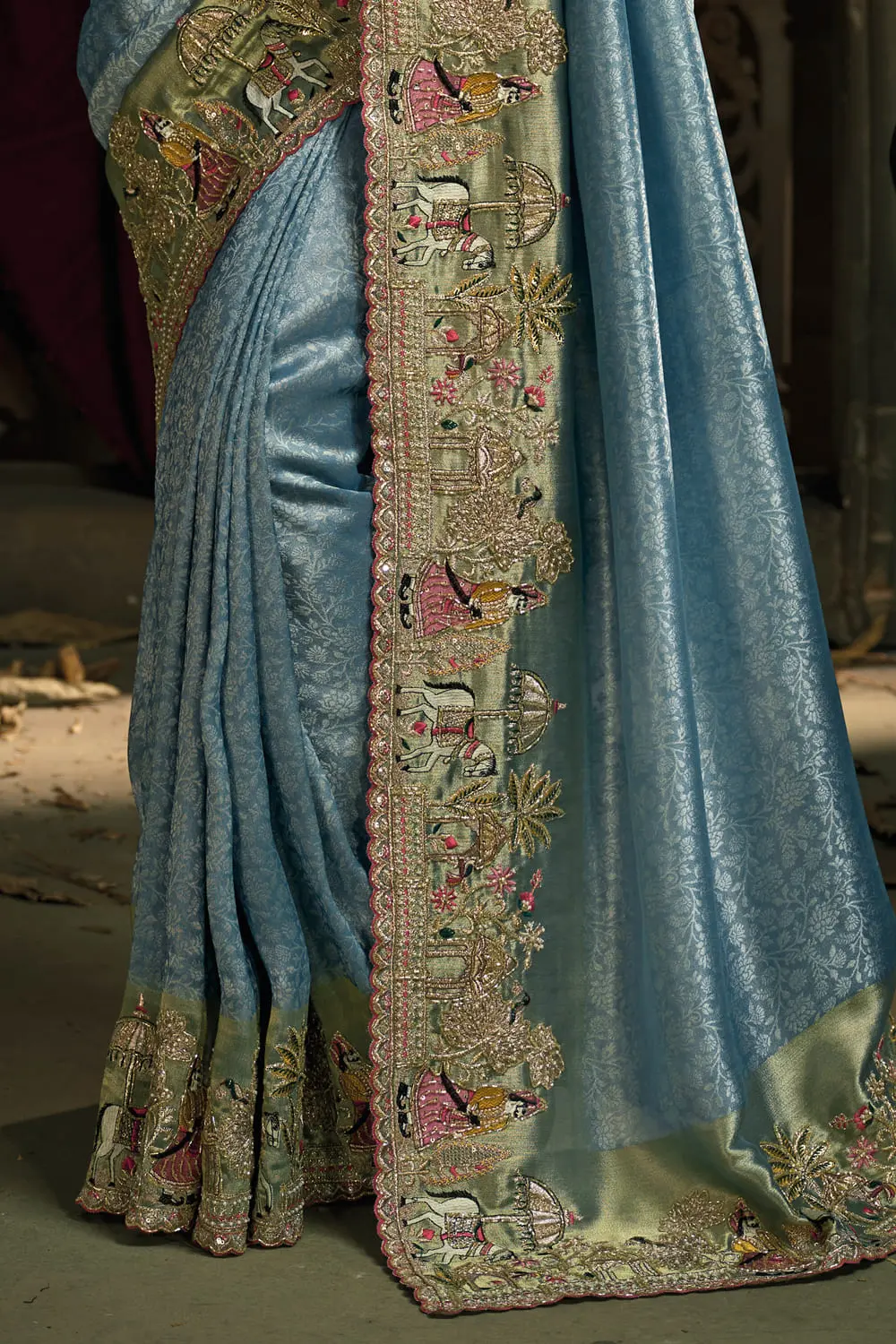 Detailed macro shot of moti and cut-dana together on Sea Green banarasi saree