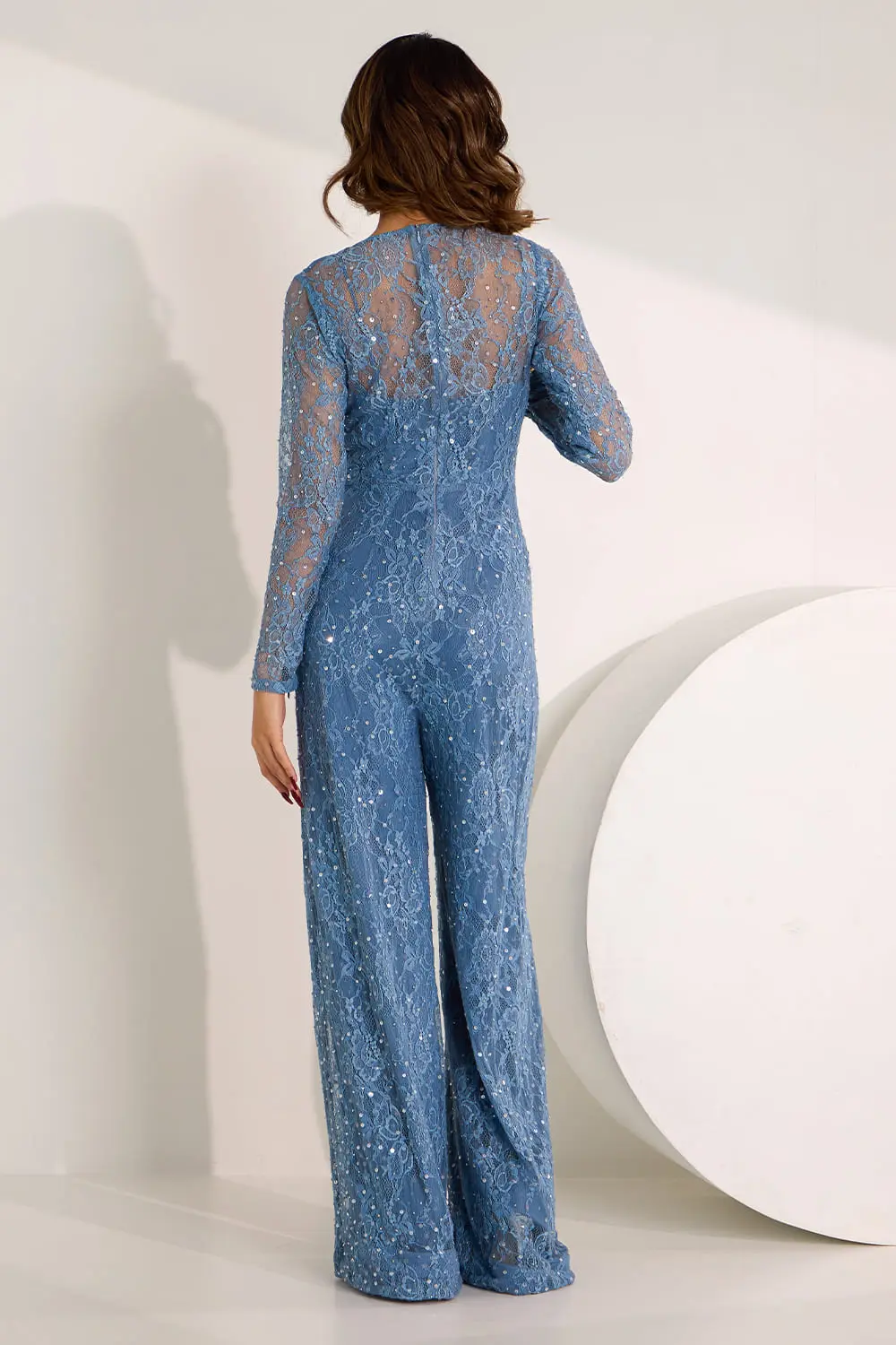 Back view of blue sequin lace jumpsuit and bodysuit set