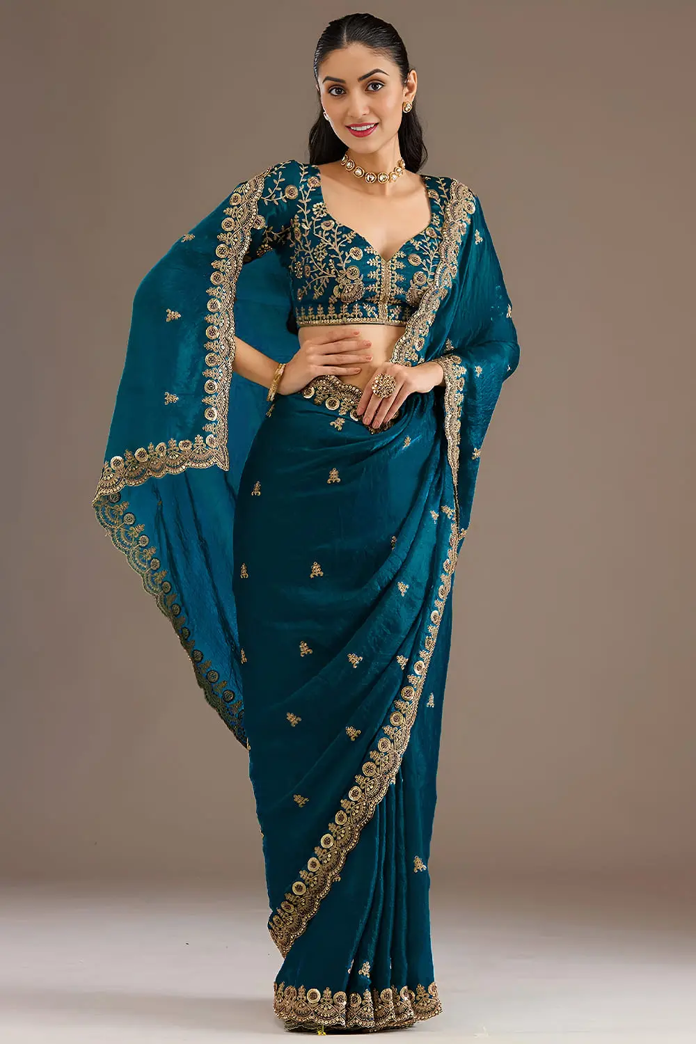 Shimmering dove blue tissue silk saree draped full view