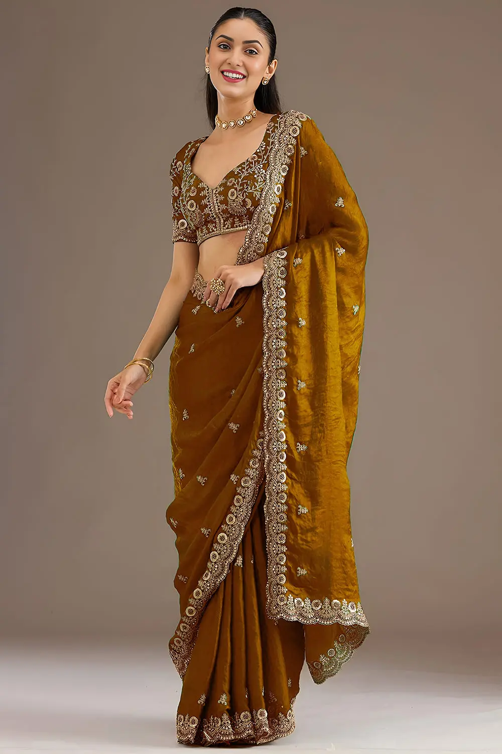 Gold tissue silk saree with diamond and pearl detailing