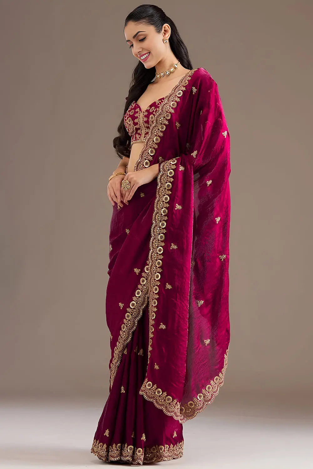 Side view of maroon tissue silk saree with sequins work