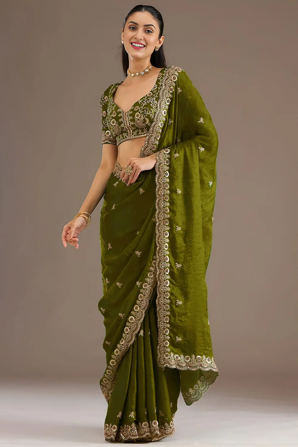 Olive green tissue silk saree with diamond and pearl detailing