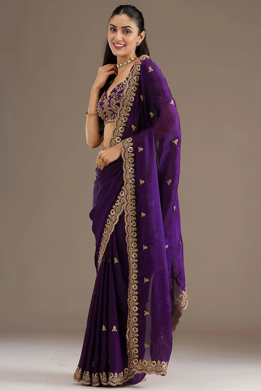 Side view of purple tissue silk saree with sequins work