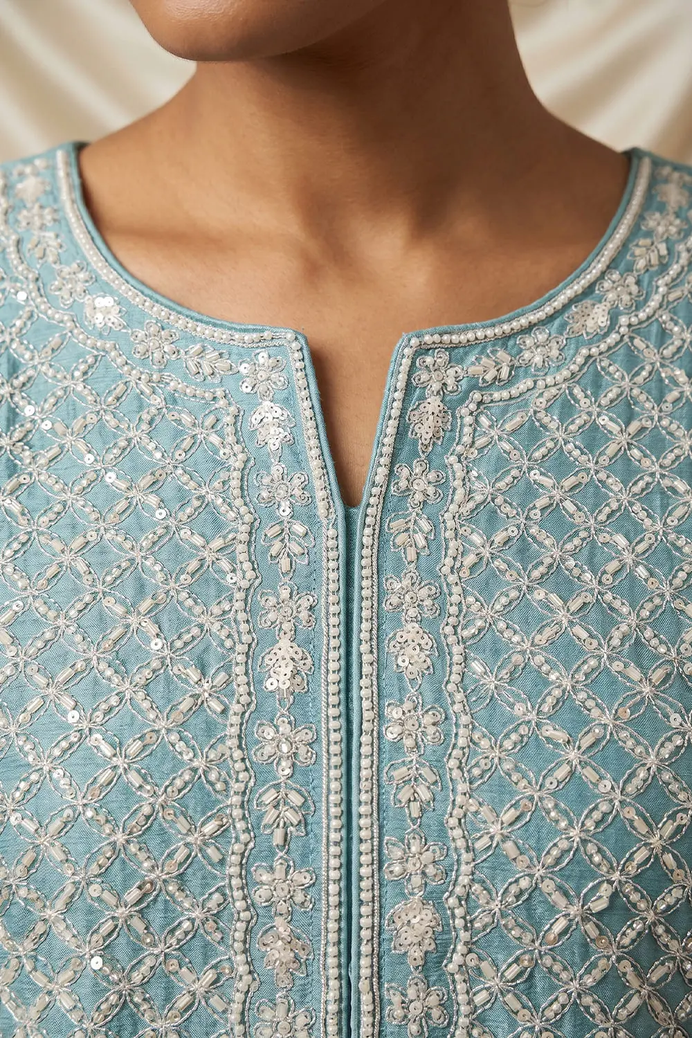 Heavy look beads work detail on premium chinnon silk top
