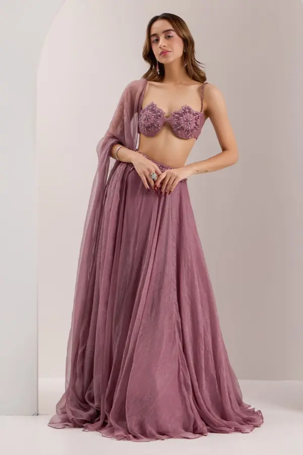 Mauve corset lehenga for wedding in organza with mix media embroidery by Khaish