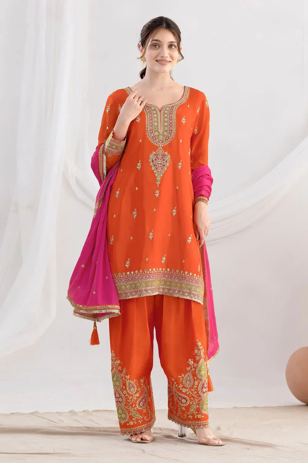 Orange Chinon Salwar Kameez with Embroidered Kurti and Zari Lace Dupatta Orange Chinon Salwar Kameez with Embroidered Kurti and Zari Lace Dupatta