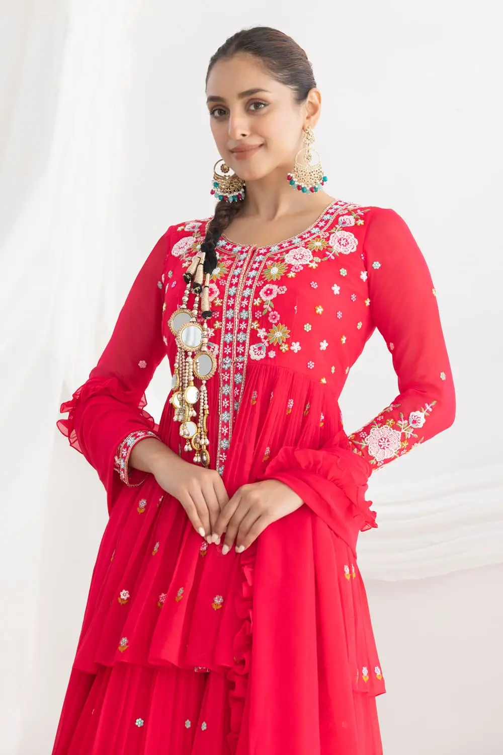 Pink georgette kurta lehenga styled with four side frill dupatta