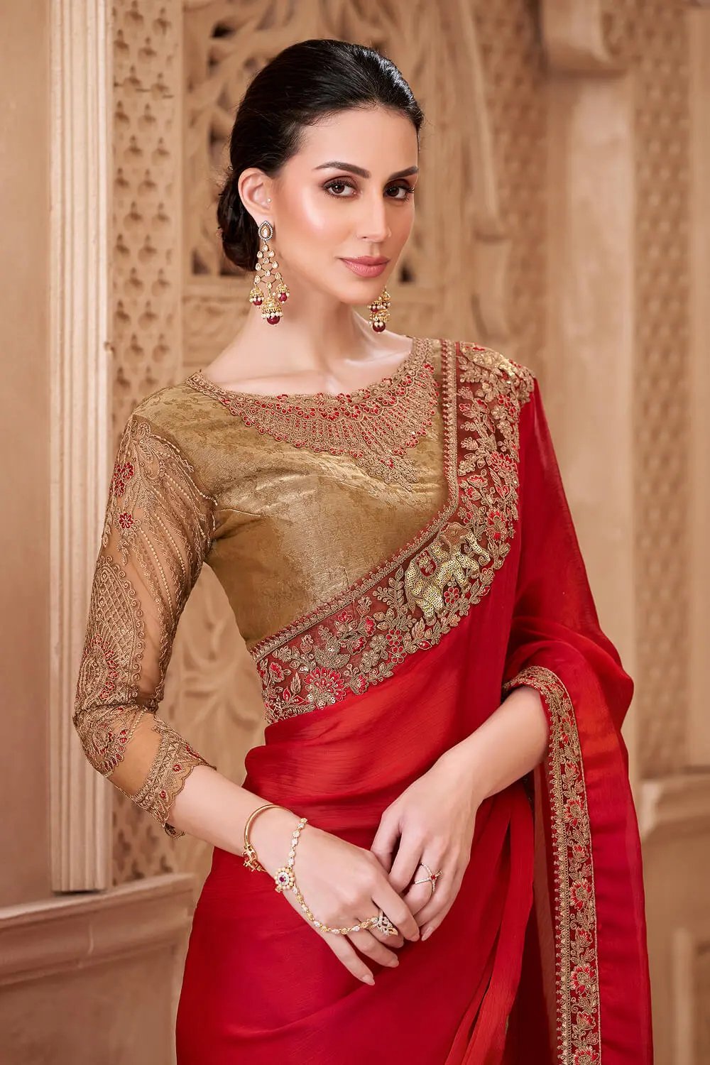 Blooming red satin silk saree styled with brocade silk blouse