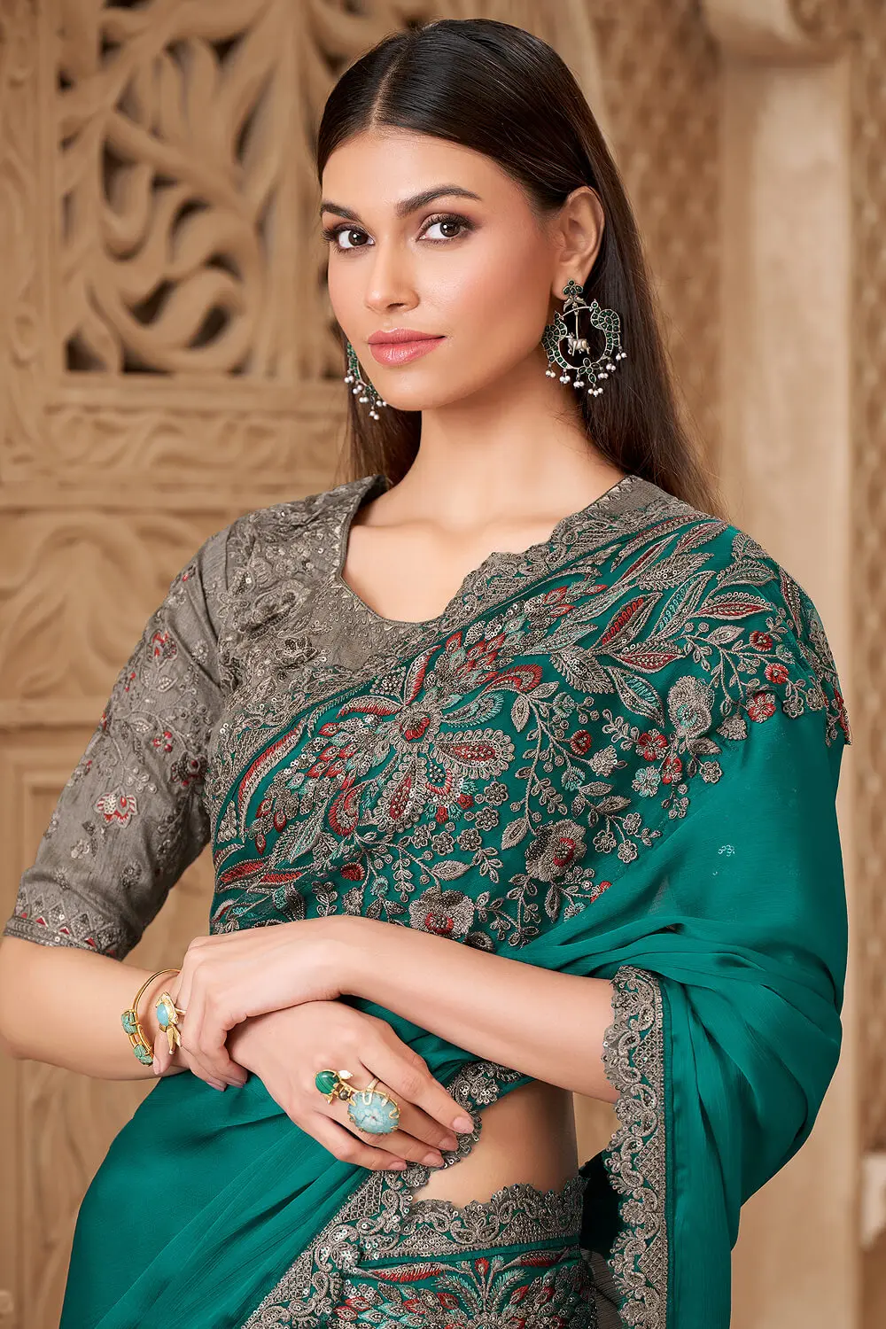 Teal green satin silk saree styled with Tussar silk blouse