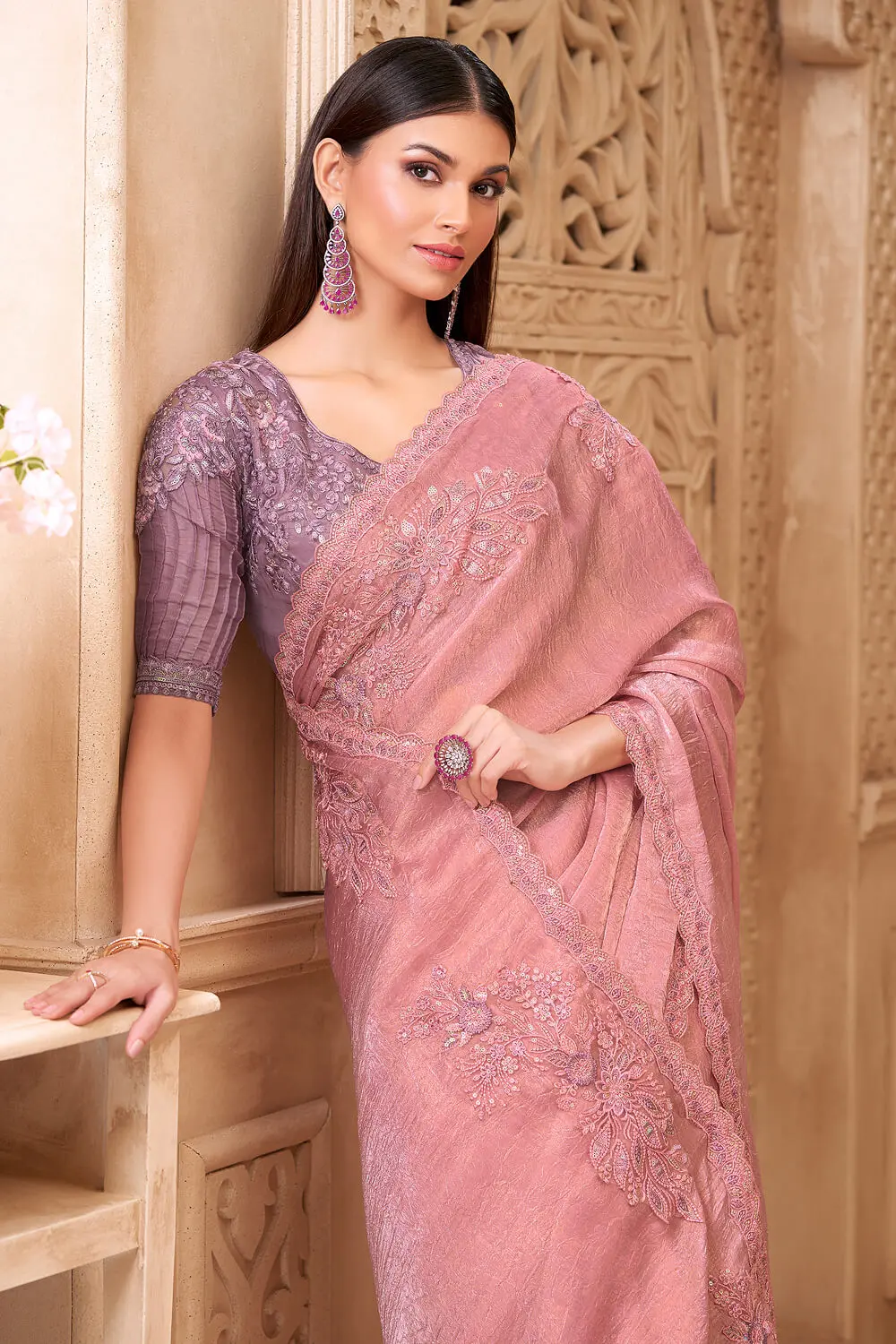 Pink crush satin georgette saree styled with satin silk blouse