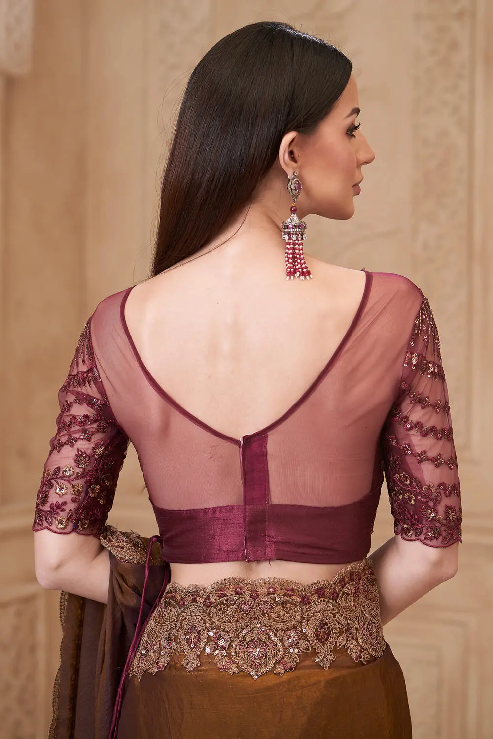 Back pallu view of Brown Satin Georgette Embroidered Saree