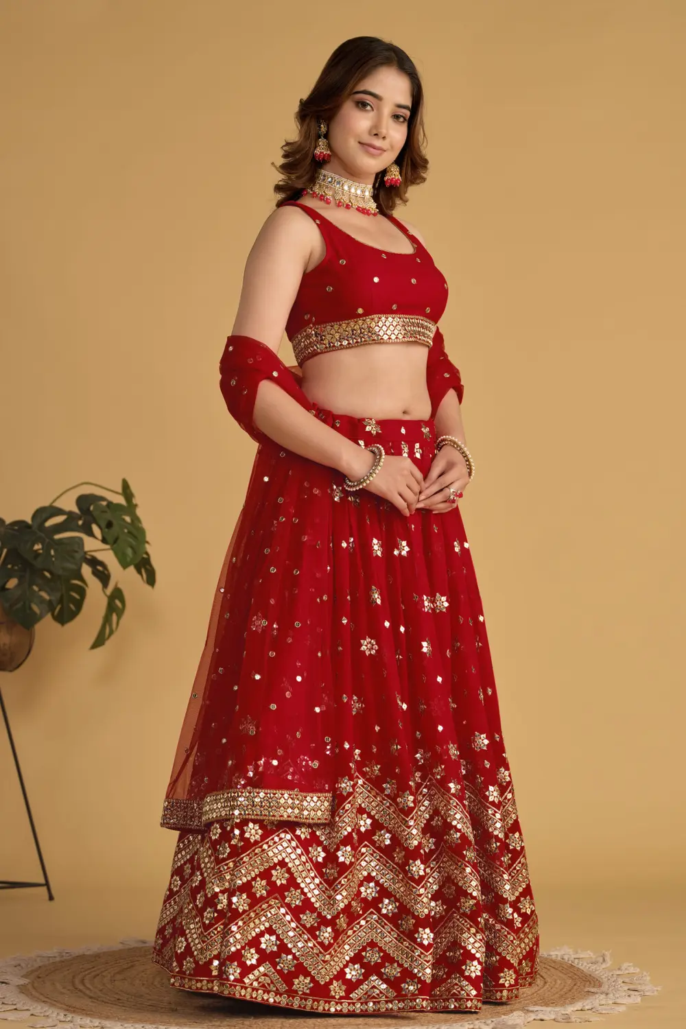 Soft net blouse with sequins and zari embroidery in bridal red