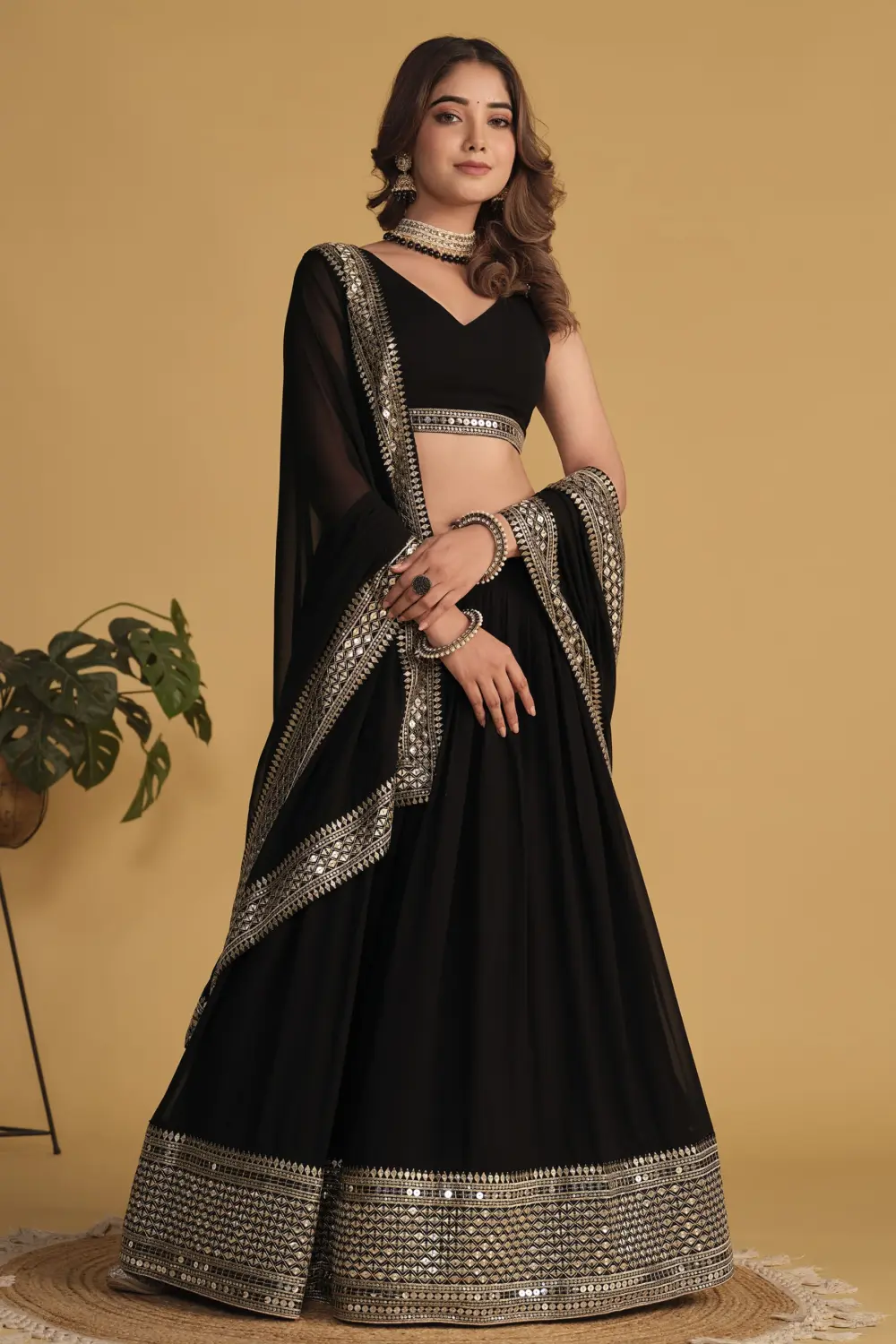 Gold sequins and zari embroidery on black georgette lehenga skirt