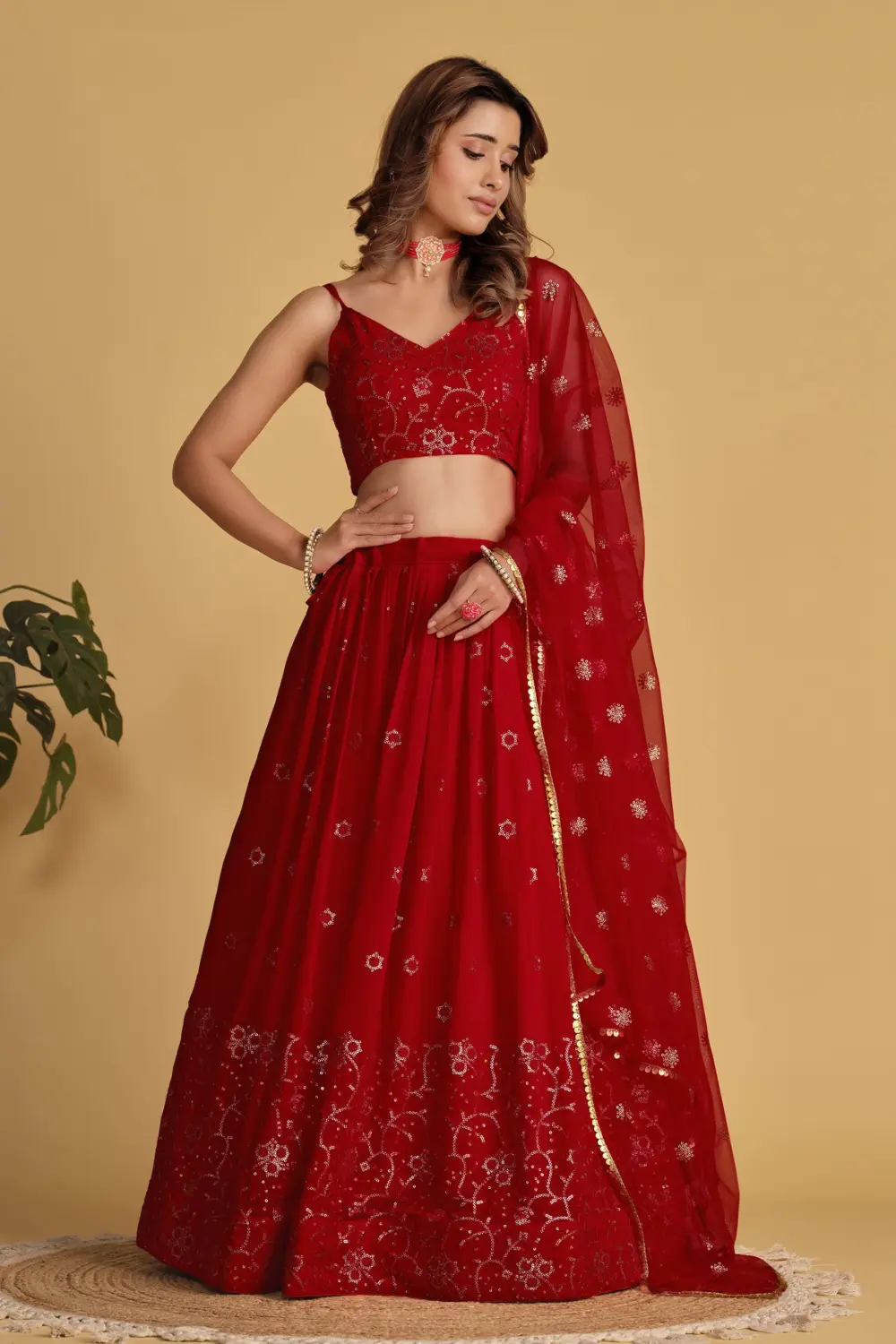 Red georgette lehenga for festive wear with sequins zari work by Khaish