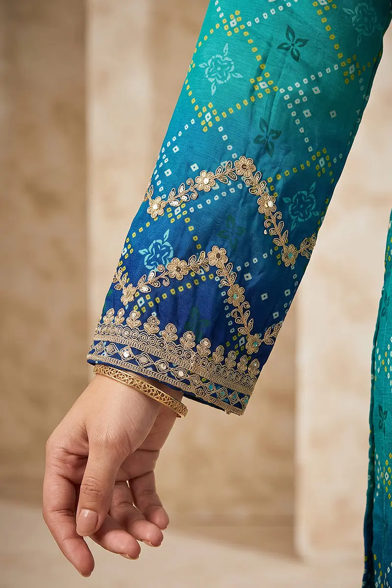 Close up of sleeve embroidery and mirror work on teal purple ombre kurta