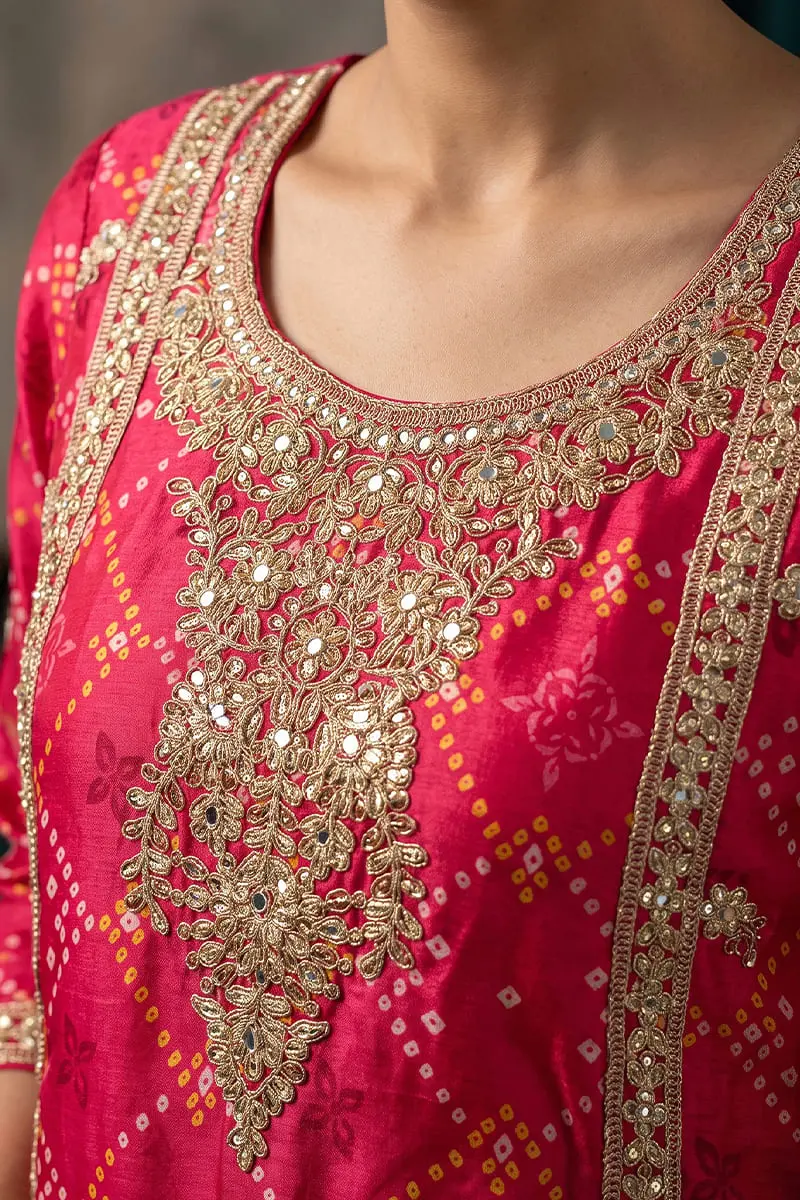 Close up of heavy embroidery and mirror work on hot pink purple ombre kurta top