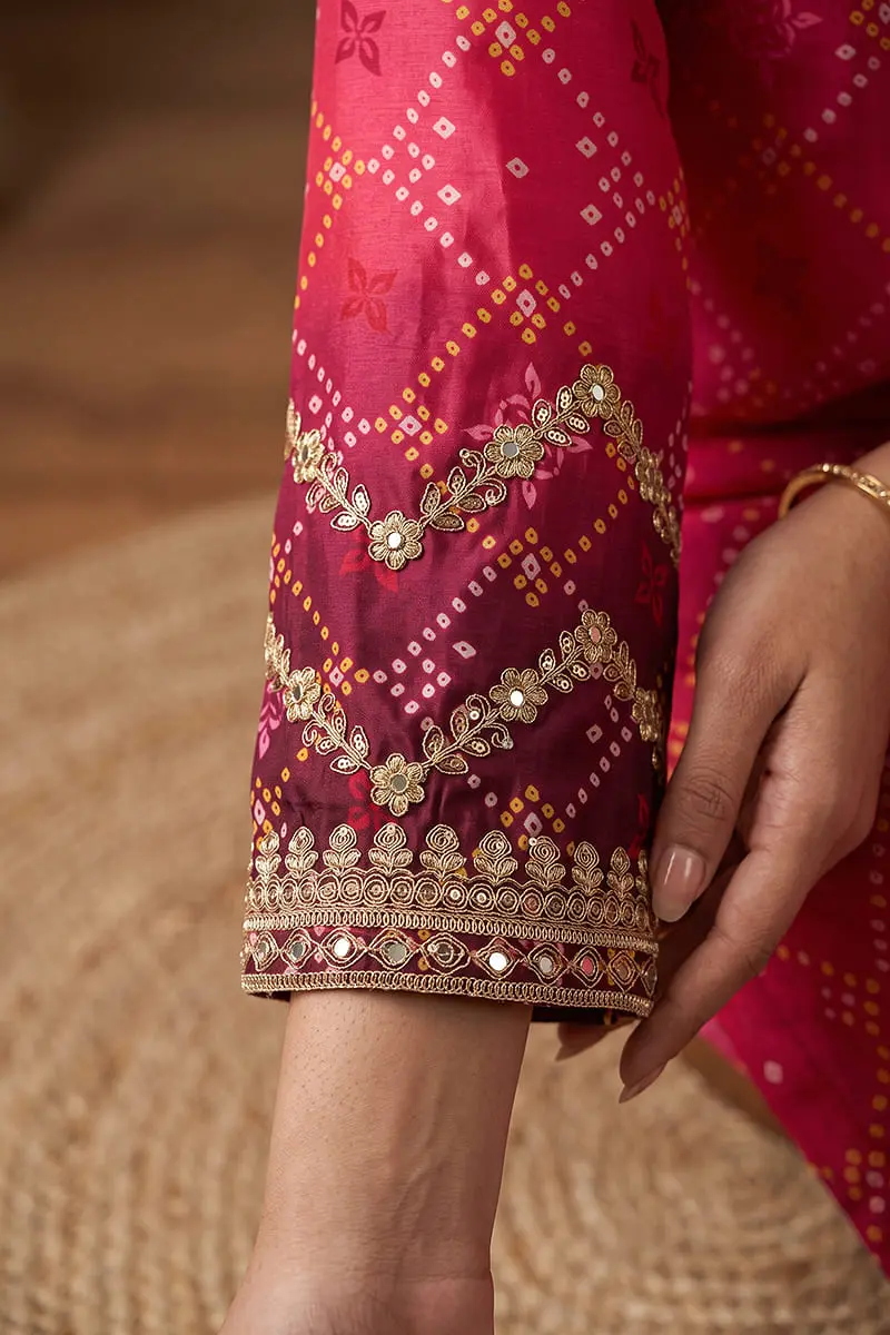 Close up of sleeve embroidery and mirror work on hot pink purple ombre kurta