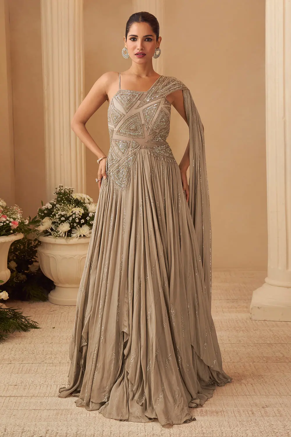 Beige chinon silk cape style wedding gown with can-can flare full view